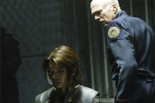 08-1 Sol Tigh (Michael Hogan) interrogates Boomer (Grace Park)